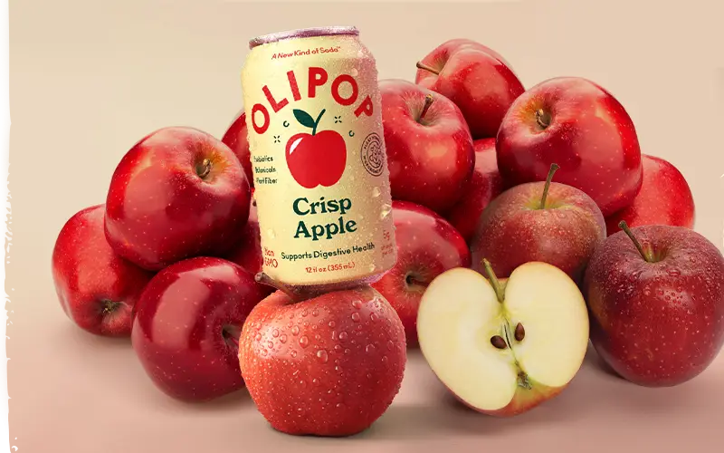 olipop crisp apple flavor surrounded by apples