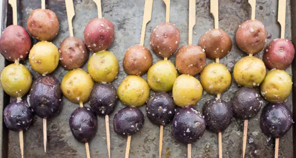 grilled potato skewers on a serving dish
