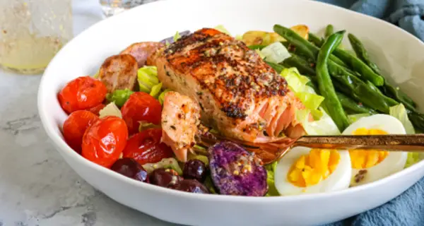 baked salmon salad in a bowl