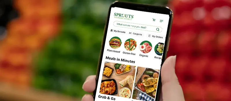 Phone with the sprouts app open on screen