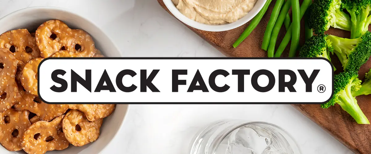 Snack Factory Pretzel Crisps logo next to a bowl of pretzels