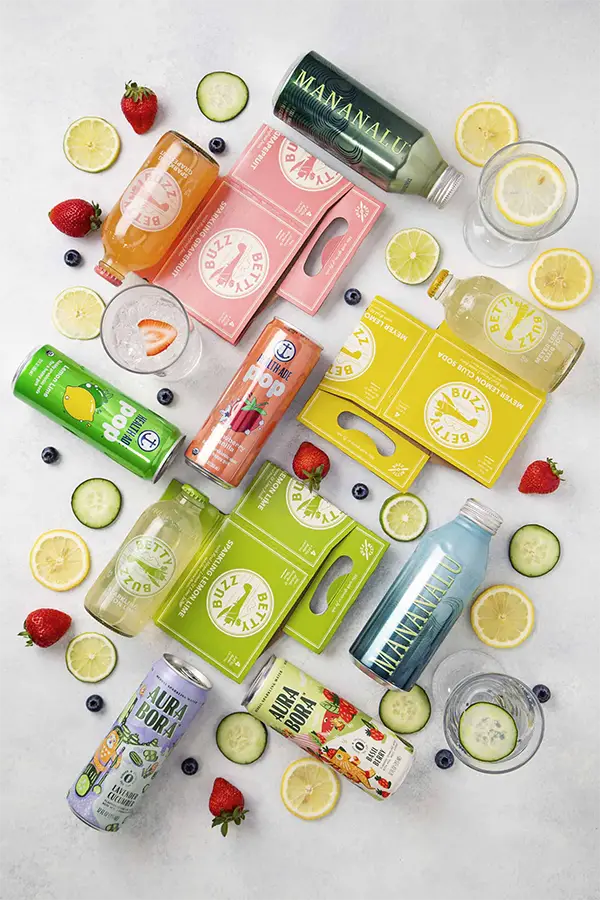 hydrating beverages surrounded by sliced fruits