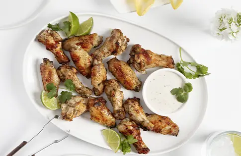 marinated chicken wings on a plate
